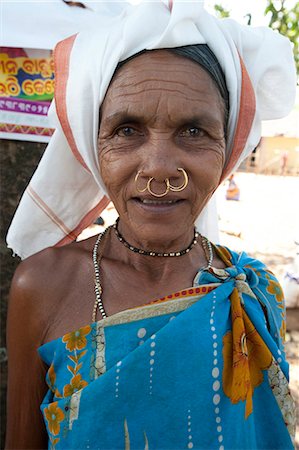 Mali tribeswoman with gold nose rings in Mali weekly tribal market, Guneipada, Koraput district, Orissa (Odisha), India, Asia Stock Photo - Rights-Managed, Code: 841-08149674