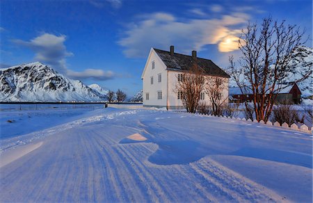 Typical house surrounded by snow on a cold winter day at dusk, Flakstad, Lofoten Islands, Norway, Scandinavia, Europe Stock Photo - Rights-Managed, Code: 841-08211541