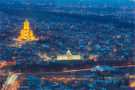 Presidential Palace and Tbilisi Sameda Cathedral (Holy Trinity) biggest Orthodox Cathedral in Caucasus, Tbilisi, Georgia, Central Asia, Asia Stock Photo - Rights-Managed, Code: 841-08279338