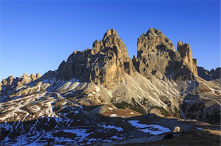 The lights of sunrise frames the Three Peaks of Lavaredo, Dolomites, Auronzo of Cadore, Veneto, Italy, Europe Stock Photo - Rights-Managed, Code: 841-08357394
