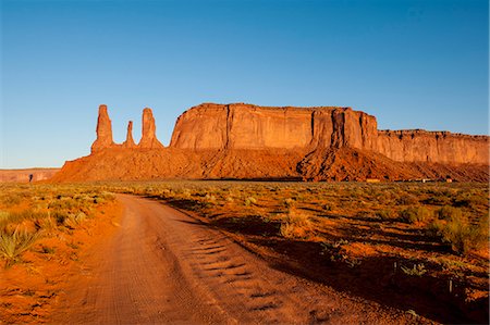 rocky valley - Three Sisters Mitchell Mesa, Monument Valley Navajo Tribal Park, Monument Valley, Utah, United States of America, North America Stock Photo - Rights-Managed, Code: 841-08421468