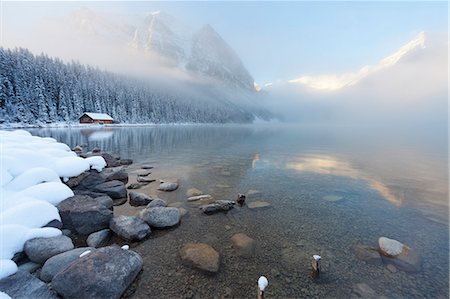scenes of snowfall in canada - Foggy sunrise at Lake Louise, Banff National Park, UNESCO World Heritage Site, Rocky Mountains, Alberta, Canada, North America Stock Photo - Rights-Managed, Code: 841-08438570