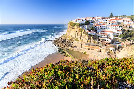 people at portugal beaches - Top view of the village of Azenhas do Mar with the ocean waves crashing on the cliffs, Sintra, Portugal, Europe Stock Photo - Rights-Managed, Code: 841-08542484