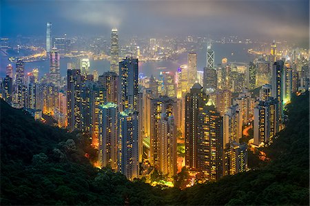 pictures of hong kong city at night - Fog envelops Hong Kong on a summer night seen from Victoria Peak, Hong Kong, China, Asia Stock Photo - Rights-Managed, Code: 841-08781792