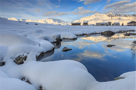 simsearch:841-08860890,k - Mountain huts and reflections in Lago Azzurro surrounded by snow, Spluga Valley, Province of Sondrio, Valtellina, Lombardy, Italy, Europe Stock Photo - Rights-Managed, Code: 841-08860685