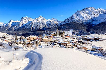 simsearch:841-08860890,k - Blue sky on the alpine village of Ftan surrounded by snow, Inn district, Canton of Graubunden, Engadine, Swiss Alps, Switzerland, Europe Stock Photo - Rights-Managed, Code: 841-08860691