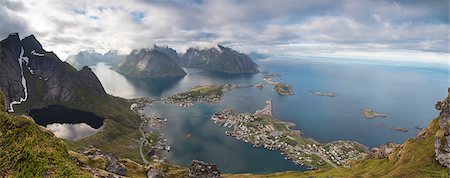 Panorama of the blue lake and sea framed by rocky peaks, Reinebringen, Moskenesoya, Lofoten Islands, Norway, Scandinavia, Europe Stock Photo - Rights-Managed, Code: 841-08887176