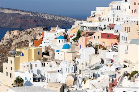 simsearch:841-05960033,k - Classic view of the village of Oia with its blue domed churches and colourful houses, Oia, Santorini, Cyclades, Greek Islands, Greece, Europe Stock Photo - Rights-Managed, Code: 841-09059934