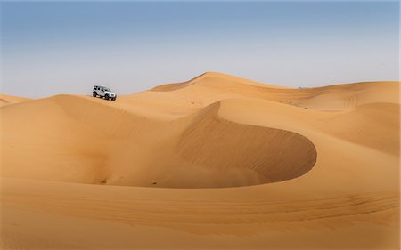 dune driving - Offroad vehicle on sand dunes near Dubai, United Arab Emirates, Middle East Stock Photo - Rights-Managed, Code: 841-09076887