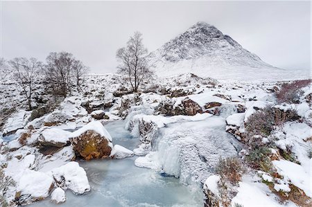 snow mountain trees river - A frozen River Coupall and Buachaille Etive Mor in winter, Glen Etive, Highlands, Scotland, United Kingdom, Europe Stock Photo - Rights-Managed, Code: 841-09135234