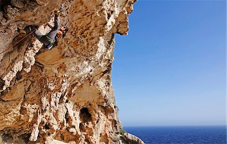 simsearch:841-07083087,k - Rock climber in action on the cliffs of Malta, Mediterranean, Europe Stock Photo - Rights-Managed, Code: 841-09163299