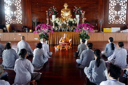 simsearch:841-08102090,k - A teacher instructs a group of people how to recite Buddhist chants, Minh Dang Quang Buddhist Temple, Ho Chi Minh City, Vietnam, Indochina, Southeast Asia, Asia Stock Photo - Rights-Managed, Code: 841-09163358