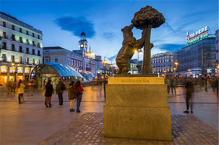 View of Bear and Strawberry Tree statue and Puerta Del Sol at dusk, Madrid, Spain, Europe Stock Photo - Rights-Managed, Code: 841-09175004