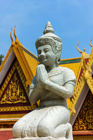 simsearch:841-07523329,k - Kneeling Buddhist statue at the Mondapa of Satra and Triptika Library in the Royal Palace, City Centre, Phnom Penh, Cambodia, Indochina, Southeast Asia, Asia Foto de stock - Con derechos protegidos, Código: 841-09257060
