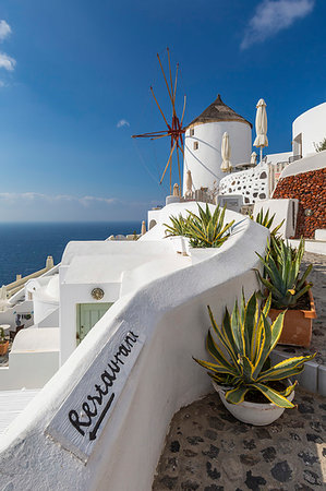 simsearch:841-05960033,k - View of windmill overlooking Oia village, Santorini, Cyclades, Aegean Islands, Greek Islands, Greece, Europe Stock Photo - Rights-Managed, Code: 841-09257077