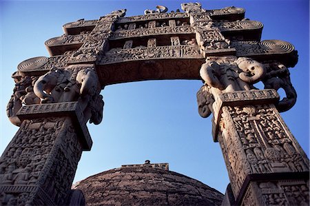 One of the four carved stone toranas (gateways), Stupa One, Buddhist shrine dating from 3rd century BC, Sanchi, UNESCO World Heritage Site, Madhya Pradesh state, India, Asia Stock Photo - Rights-Managed, Code: 841-02704526