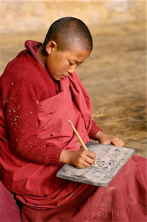 simsearch:841-02946644,k - Young Buddhist monk practising writing, Bhutan, Asia Stock Photo - Rights-Managed, Code: 841-02704739