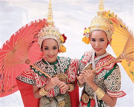 simsearch:841-02916002,k - Portrait of two dancers in traditional Thai classical dance costume, smiling and looking at the camera, Bangkok, Thailand, Southeast Asia, Asia Stock Photo - Rights-Managed, Code: 841-02705752