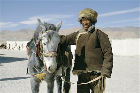 simsearch:841-03067430,k - Tibetan horseman with his horse, Tibet, China, Asia Stock Photo - Rights-Managed, Code: 841-02705929