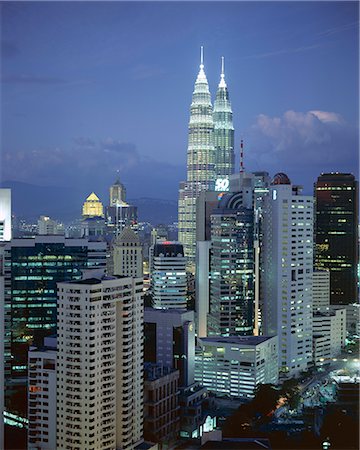 City skyline in the evening, with the twin towers of the Petronas Building, Kuala Lumpur, Malaysia, Asia Stock Photo - Rights-Managed, Code: 841-02706223