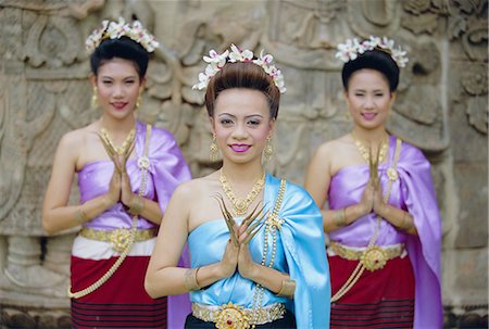 simsearch:841-03067430,k - Portrait of three traditional Thai dancers, Chiang Mai, northern Thailand, Asia Stock Photo - Rights-Managed, Code: 841-02706524