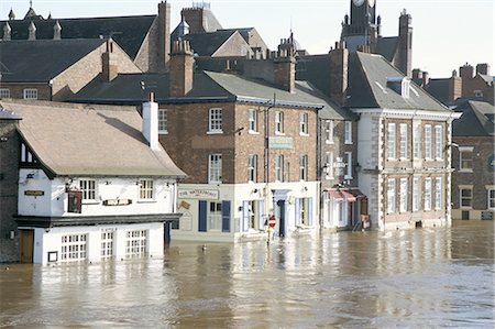 flooded homes - Flooded street in 2002, York, Yorkshire, England, United Kingdom, Europe Stock Photo - Rights-Managed, Code: 841-02706915