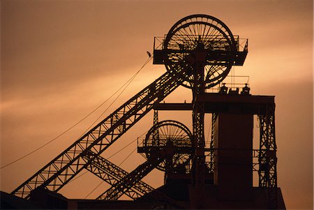 Coalmine pithead silhouetted at dusk, South Wales, United Kingdom, Europe Stock Photo - Rights-Managed, Code: 841-02708301