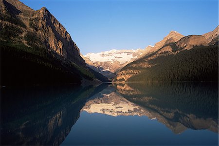 simsearch:841-02920671,k - View to Mount Victoria across the still waters of Lake Louise, at sunrise in summer, Banff National Park, UNESCO World Heritage Site, Alberta, Canada, North America Stock Photo - Rights-Managed, Code: 841-02708828