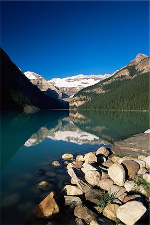 simsearch:841-02920671,k - View to Mount Victoria across the emerald waters of Lake Louise, in summer, Banff National Park, UNESCO World Heritage Site, Alberta, Canada, North America Stock Photo - Rights-Managed, Code: 841-02708830