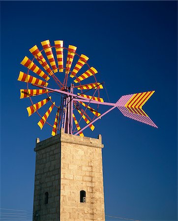 simsearch:841-02708432,k - Windmill with sails in the colours of the Mallorcan flag, near Palma, Mallorca, Balearic Islands, Spain, Europe Stock Photo - Rights-Managed, Code: 841-02708924