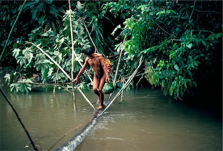 simsearch:841-02709392,k - Yanomami man carrying peach palm fruit crossing a river, Brazil, South America Stock Photo - Rights-Managed, Code: 841-02709398