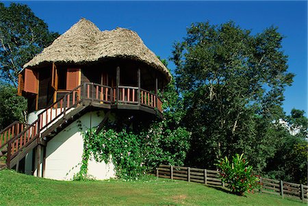 A guest cottage in the gardens of Chaa Creek Cottages in Belize, Central America Stock Photo - Rights-Managed, Code: 841-02709430