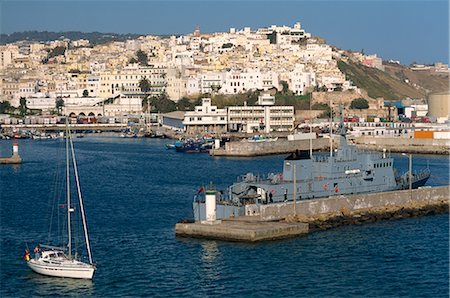 Warship moored in the harbour and the old town behind, Tangier, Morocco, North Africa, Africa Stock Photo - Rights-Managed, Code: 841-02703393