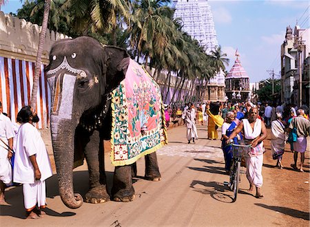 decorated asian elephants - An elephant leads procession of huge chariot outside Sri Ranganathaswami Temple, Srirangam, Near Tiruchirappalli, Tamil Nadu state, India, Asia Stock Photo - Rights-Managed, Code: 841-02703872