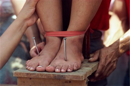 Lucy Reves crucifixion during Holy Week at Easter in Capitanan village in Bulacan Provice, Philippines, Southeast Asia, Asia Stock Photo - Rights-Managed, Code: 841-02703975