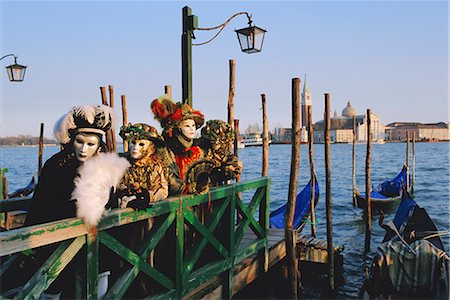 simsearch:841-02714288,k - People wearing masked carnival costumes, San Giorgio in the background, Venice Carnival, Venice, Veneto, Italy Stock Photo - Rights-Managed, Code: 841-02714230