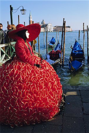 simsearch:841-02714288,k - Person wearing masked carnival costume, San Giorgio in the background, Venice Carnival, Venice, Veneto, Italy Stock Photo - Rights-Managed, Code: 841-02714288