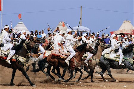 Fantasia for the moussem (festival) of Moulay Abdallah, El Jadida, Morocco, Africa Stock Photo - Rights-Managed, Code: 841-02714332