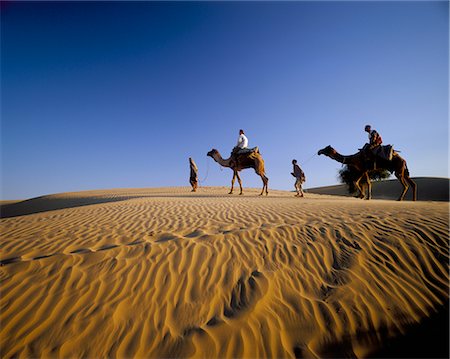Caravan of people and camels in the Thar Desert, Rajasthan state, India, Asia Stock Photo - Rights-Managed, Code: 841-02715068