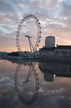 The London Eye reflected in the calm water of the River Thames in the early morning, London, England, United Kingdom, Europe Stock Photo - Rights-Managed, Code: 841-02716385