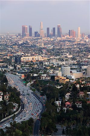 Downtown district skyscrapers and cars on a city highway, Los Angeles, California, United States of America, North America Stock Photo - Rights-Managed, Code: 841-02716879