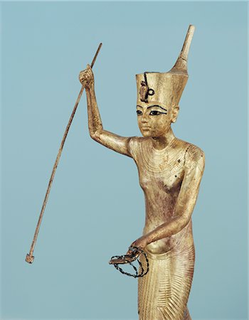 simsearch:841-03032736,k - Gilt wood statuette of Tutankhamun on a boat with a harpoon, from the tomb of the pharaoh Tutankhamun, discovered in the Valley of the Kings, Thebes, Egypt, North Africa, Africa Stock Photo - Rights-Managed, Code: 841-02717774