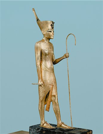 simsearch:841-03032736,k - Gilt wood statuette of the king, from the tomb of the pharaoh Tutankhamun, discovered in the Valley of the Kings, Thebes, Egypt, North Africa, Africa Stock Photo - Rights-Managed, Code: 841-02717775