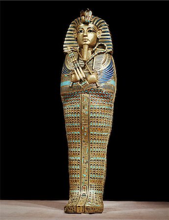 One of the four small gold mummiform coffins placed in the canopic urns, from the tomb of the pharaoh Tutankhamun, discovered in the Valley of the Kings, Thebes, Egypt, North Africa, Africa Stock Photo - Rights-Managed, Code: 841-02717794