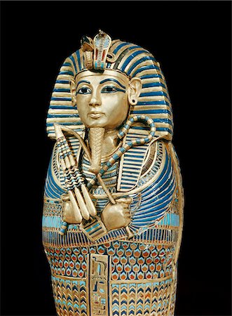 photography casket - One of the four small gold mummiform coffins placed in the canopic urns, from the tomb of the pharaoh Tutankhamun, discovered in the Valley of the Kings, Thebes, Egypt, North Africa, Africa Stock Photo - Rights-Managed, Code: 841-02717795