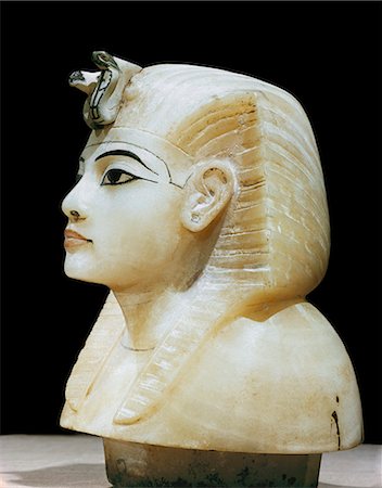 simsearch:841-03032736,k - Stopper in the form of the king's head from one of the four canopic urns, from the tomb of the pharaoh Tutankhamun, discovered in the Valley of the Kings, Thebes, Egypt, North Africa, Africa Stock Photo - Rights-Managed, Code: 841-02717803