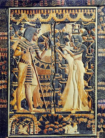 Painted ivory plaque from the lid of a coffer showing Tutankhamun and Ankhesenamun in a garden, the lower frieze shows young women plucking mandrakes, from the tomb of the pharaoh Tutankhamun, discovered in the Valley of the Kings, Thebes, Egypt, North Africa, Africa Stock Photo - Rights-Managed, Code: 841-02717847