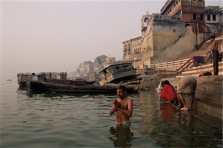 Morning ablutions, Hindu pilgrims bathing in the River Ganges (Ganga), Varanasi (Benares), Uttar Pradesh state, India, Asia Stock Photo - Rights-Managed, Code: 841-02717903