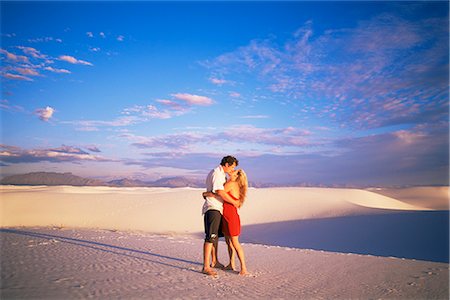 simsearch:841-02720357,k - Couple kissing, White Sands National Monument, New Mexico, United States of America, North America Stock Photo - Rights-Managed, Code: 841-02718564