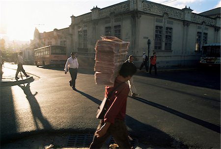 simsearch:841-03507904,k - Morning activity on the streets, boy carrying newspapers, San Jose, Costa Rica, Central America Stock Photo - Rights-Managed, Code: 841-02718621